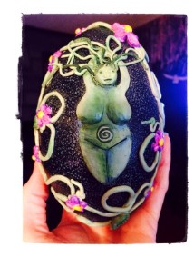 Finished Spring Goddess Ostara Emu Egg with clay goddess figure, vines, and flowers